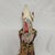 Handcrafted Indonesian Wayang Golek rod puppet featuring a detailed carved wooden head with blue eyes and a traditional...