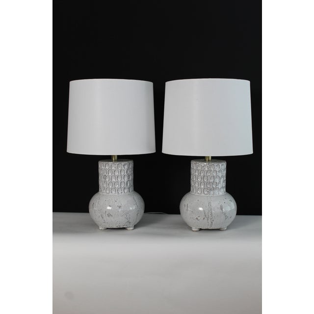 Beautiful pair of Albert Tormos influence Ceramic lamps. Rustic glazed design that gives interesting color variations....