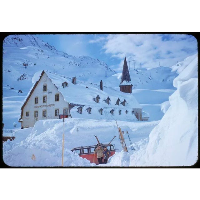 A Hotel In The Mountains 1955 Skiers and a car in front of the Alberg Hozpis Hotel, St. Anton, Austria, 1955. Toni...
