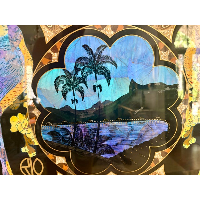 This vintage mid-century Brazilian serving tray features an inlaid wood frame and a detailed mosaic scene crafted with...