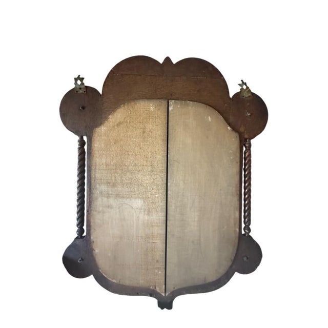 Gorgeous stained oak handmade mirror! Turned spindle on each side and scroll word or filigree wood design Four metal coat...