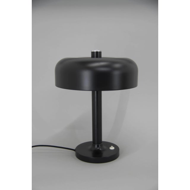 Big black table lamp. New paint minor loses of color seen on photos. 2 x 40w, e25-e27 bulbs us plug adapter included. This...