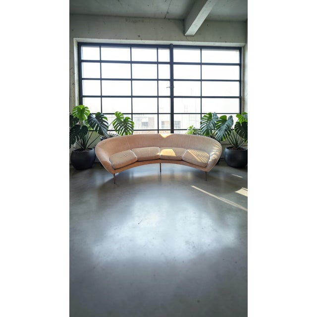 Large, curved, four-seater sofa in original bouclé fabric. Wooden frame, brass end pieces. Excellent vintage condition,...