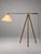 Striking vintage tripod floor lamp with a distinctive architectural design. The lamp features a tall three-legged metal...