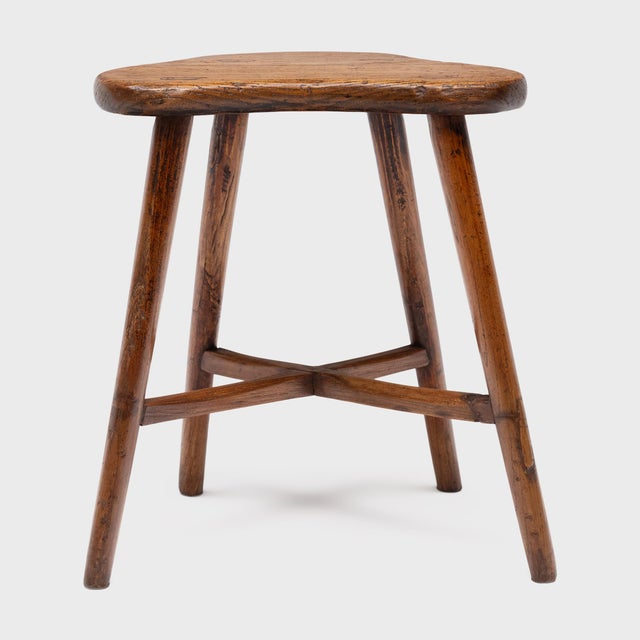 This 19th-century everyday stool is a wonderful example of form meets function. Crafted of northern elm (yumu) using...