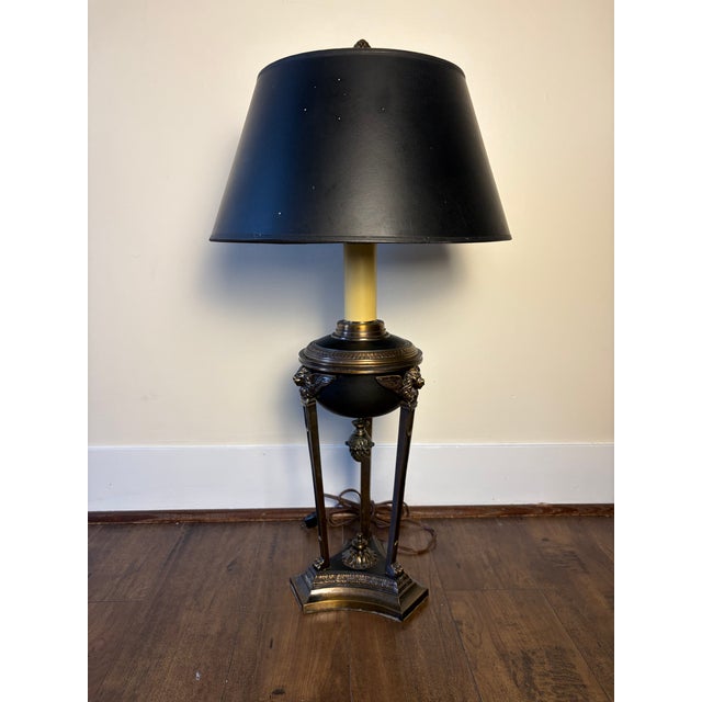 Striking vintage Neoclassical table lamp distinguished by unusually elaborate sculptural metalwork and architectural...