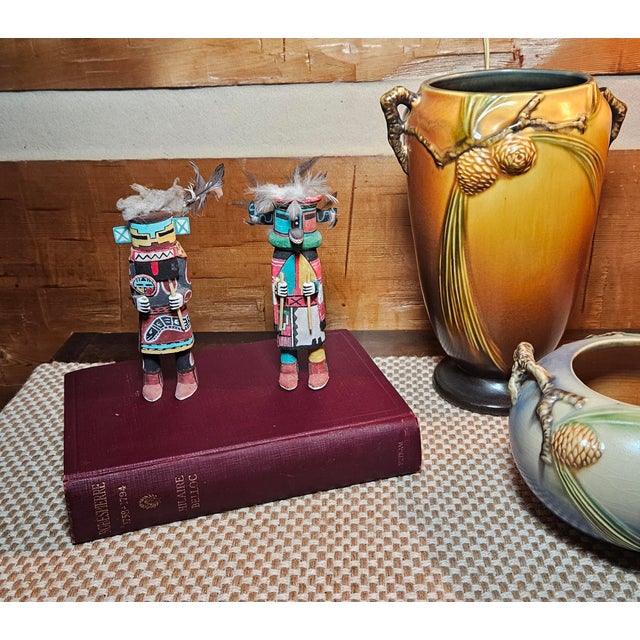 This beautiful, authentic matched pair of Hopi-Tewa Kachina dolls was hand-carved by renowned master artist Larry David, a...
