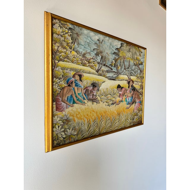 This vintage acrylic painting by Kasta from Penestanan, Ubud, beautifully captures a tropical landscape in a traditional...