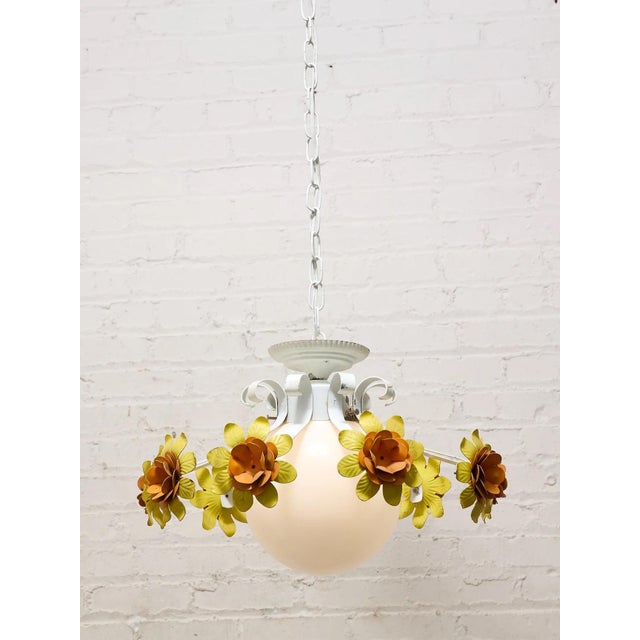 Light up your space with an assortment of one-of-a-kind and vintage pendants lights, chandeliers, and hanging lighting.