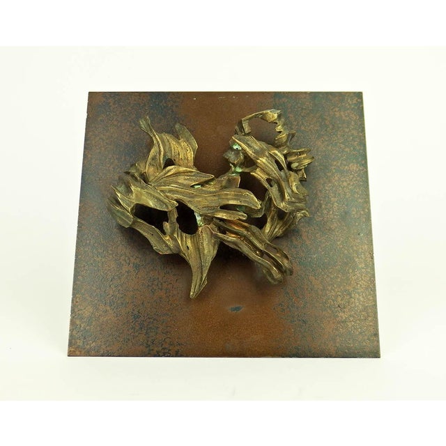Abstract bronze sculpture fixed on a black patinated and oxidized steel plate, steel support. France, unsigned. The...