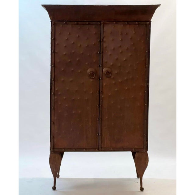 This vintage hammered hobnail metal armoire is amazing. I originally bought this for myself but the logistics of getting...