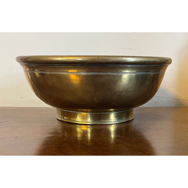 Antique 18th century Dutch brass footed fruit bowl. Heavy weight with concentric hand chased lines inside and out. Nice...