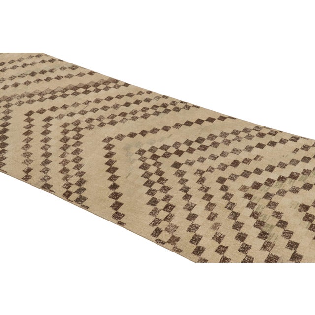 This vintage rug is a 3x9 Turkish distressed piece, made with hand-knotted wool circa mid-20th century. It is an exciting...