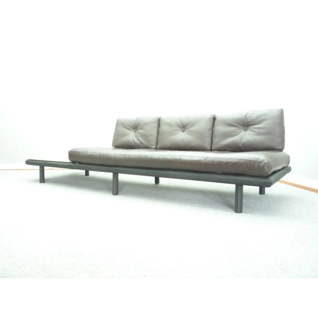 Sofa with integrated coffee table from Kill International. Refined design by from Franz Köttgen. Also suitable as a daybed...