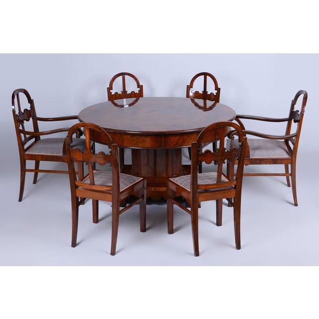 Introducing a truly unique and magnificent British Art Deco dining set from the 1920s, an embodiment of luxury and...