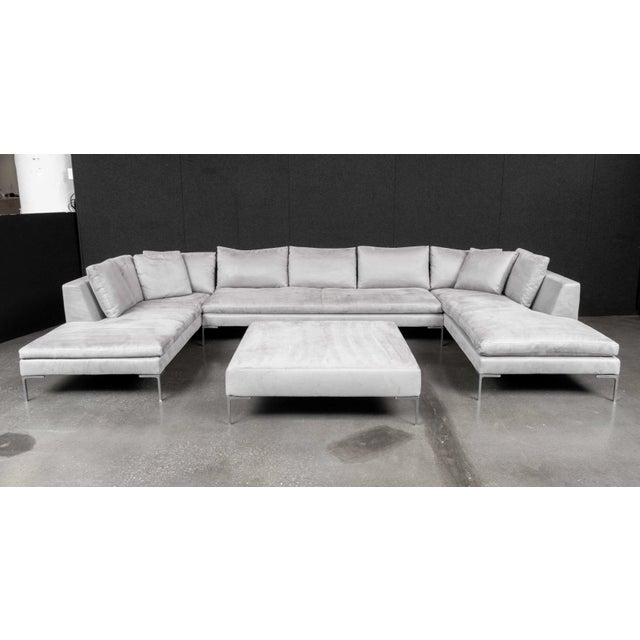 B&amp;B Italia Grey Suede Upholstered Sectional Sofa, in four pieces: two chaise longues, a three-seat banquette, and a...