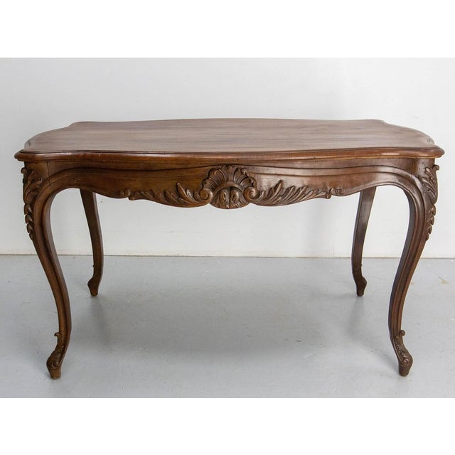 Antique poplar dining table, made in the 19th century in the Louis 15 style. This very old table has been completely...