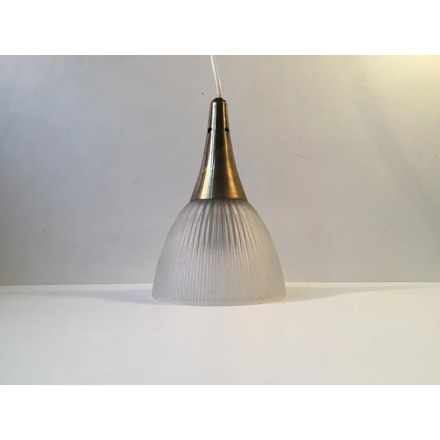 - Small Swedish ceiling light composed of fluted matte glass and a partially perforated brass top - Unknown Swedish...