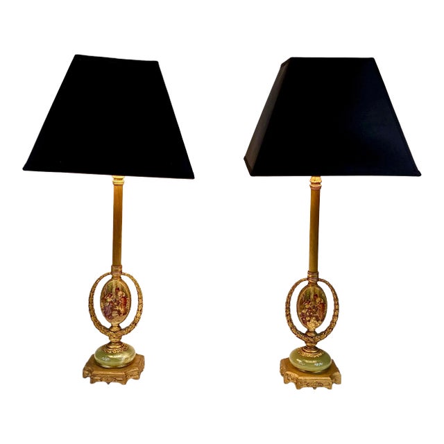 A Pair of Gold Gild Bronze Lamps With Onex For Sale