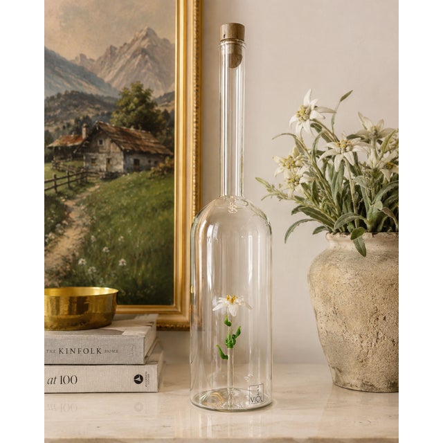 An exceptional and uncommon vintage hand-blown art glass bottle by VIOL Glas, retaining both its original factory foil...