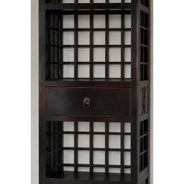 This elegant black lacquer display cabinet was purchased from Asian Barn, the well-known New York retailer of Asian-...