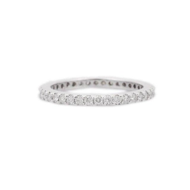This is part of Chairish’s Fine Jewelry assortment. Stackable Diamond Eternity Engagement Band Ring in 18K Gold symbolizes...