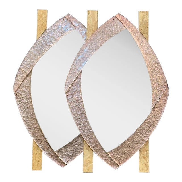 Gorgeous pair of pink Murano glass mirrors. Add beautiful shape and texture to your decor. Creates a stunning focal point...