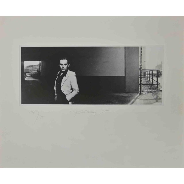 An Island in the Air is a Photograph realized by Urs Luthi in 1975. from the portfolio "Un'isola nell'aria", Vol. IV,...