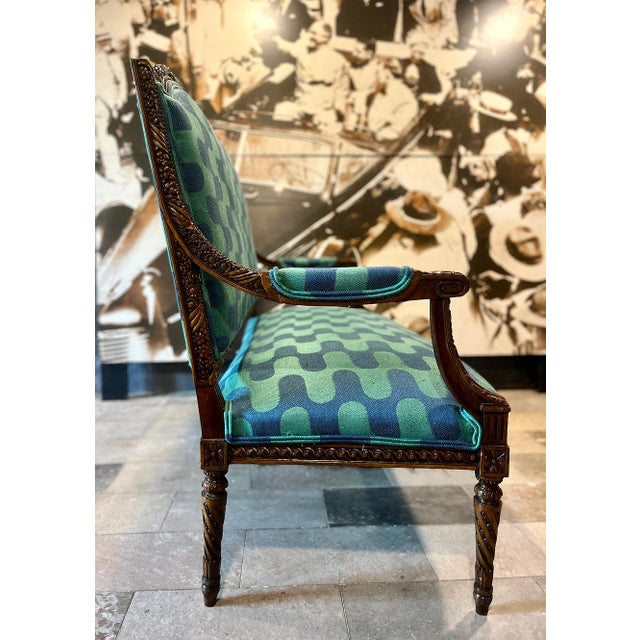 This stunning piece features remarkable workmanship of a level rarely seen. The heavily carved walnut frame includes...
