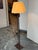 Design Plus Gallery presents a Vintage Floor Lamp from Hubbardton Forge. This piece showcases a linear metal framework...