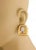 This is a chic authentic fashionable pair of earrings by David Webb, they are crafted from 18k yellow gold with platinum...