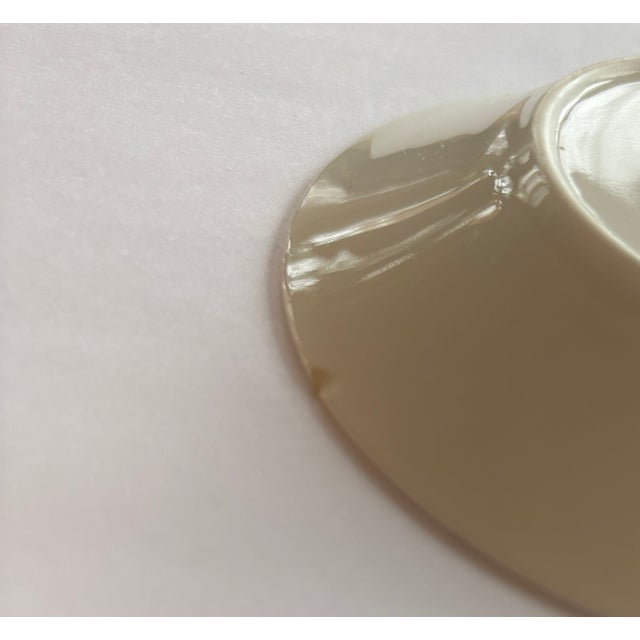 A charming pair of cups and matching saucers from Royal Doulton’s iconic “Reynard the Fox” pattern, made for G.B. & Sons...