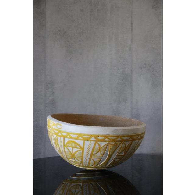 Hand-carved and beautifully crafted natural Calabash gourd bowl, made by artisans in West Africa with gorgeous tribal...