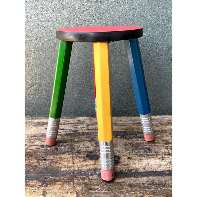 Add a playful dose of vintage charm to your interior with this whimsical multicolor pencil stool, a delightful example of...