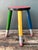 Add a playful dose of vintage charm to your interior with this whimsical multicolor pencil stool, a delightful example of...