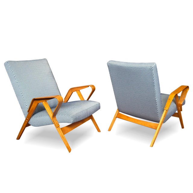 A timeless pair of armchairs designed by František Jirák for Tatra Pravenec in the 1960s–70s. The model combines post-war...