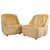 A pair of elegant club chairs on wheels. They originate from Germany in the 1970s. They are made of firm polyurethane foam...