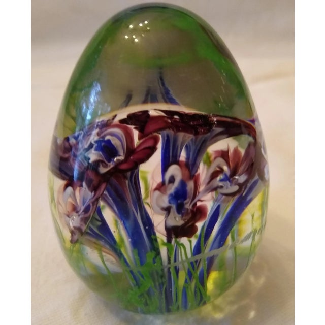 Acquired in the 1960's. Made of blown glass. An unusual egg shape.