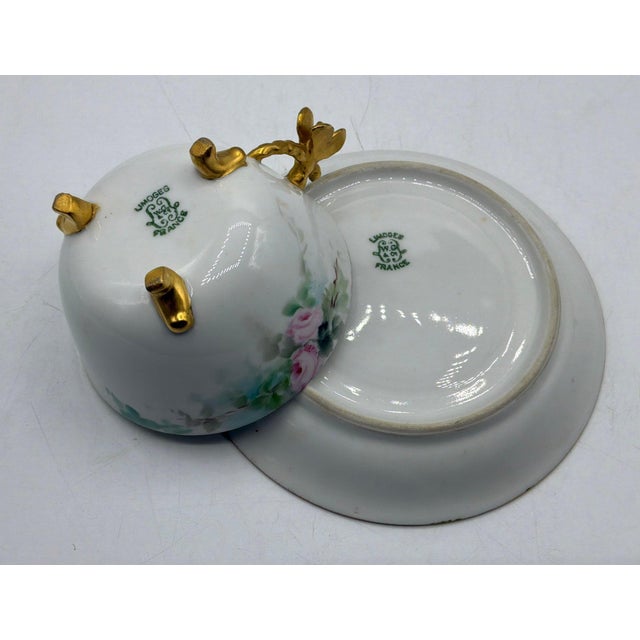 Lovely, antique porcelain cup and saucer set marked “Limoges, W.G. & Co., France” on the underside of each piece. Delicate...