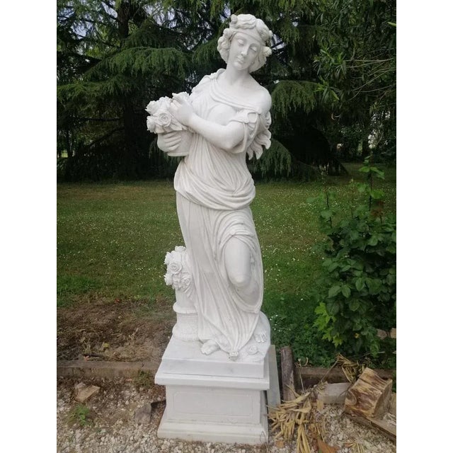 Spectacular Sculptures "The Four Seasons" in Carrara Marble 19th Century total height: 225cm statue height: 183cm base:...