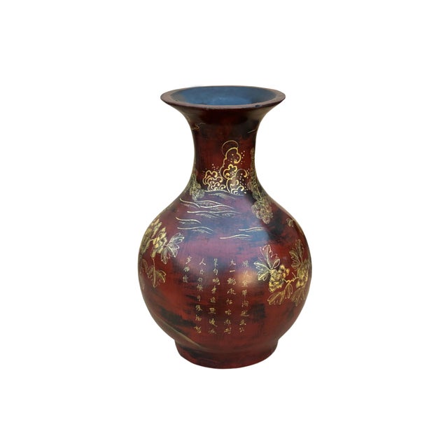 This magnificent vase is a stunning example of traditional craftsmanship, meticulously decorated with intricate details...