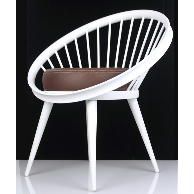 Very rare pair of italian midcentury lounge chairs ,attributed to swedese, featuring an ellipsoid-shaped backrest /armrest...