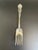 A medium solid cold meat serving fork in the Arbutus pattern by Wm Rogers & Sons / International Silver. Designed by...