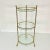 This is a lovely 3-Tier Glass and Metal round plant stand from the 1970s. The design is Hollywood Regency Boho Chic with...