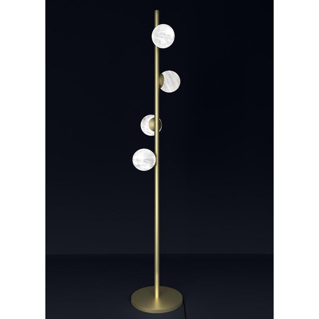 Ofione brushed brass floor lamp by alabastro italiano dimensions: d 50 x w 50 x h 170 cm. Materials: white alabaster and...