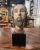 Crafted in Spain, circa 1680, this antique carved wooden bust depicts the head of Christ with a strikingly expressive,...
