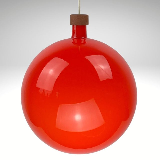 Incredible cascade pendant form Luxus Vittsjö Sweden 1960s by Uno and Östen Kristiansson consistent of 8 hand blow glass...