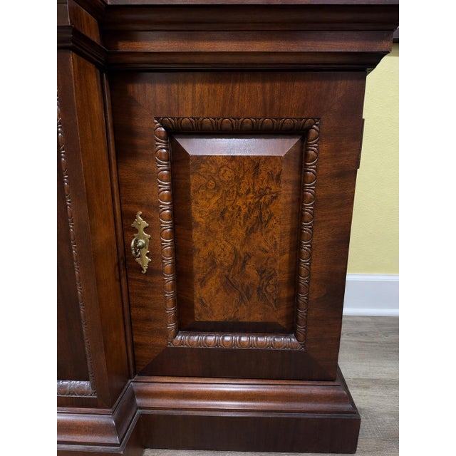 A grand and beautifully crafted Century Furniture Claridge Collection breakfront display cabinet, offering timeless...