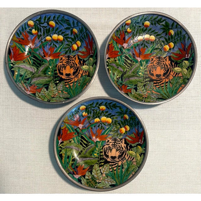 Elegant and eye-catching, this set of Gumps Tropical Tiger and Toucan plates brings a bold touch of exotic charm to any...
