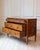 An elegant Italian Louis XVI-period chest of drawers, finely veneered and richly inlaid, dating to the late 18th century....